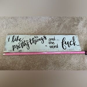 Decorative Wooden Sign with Black Text